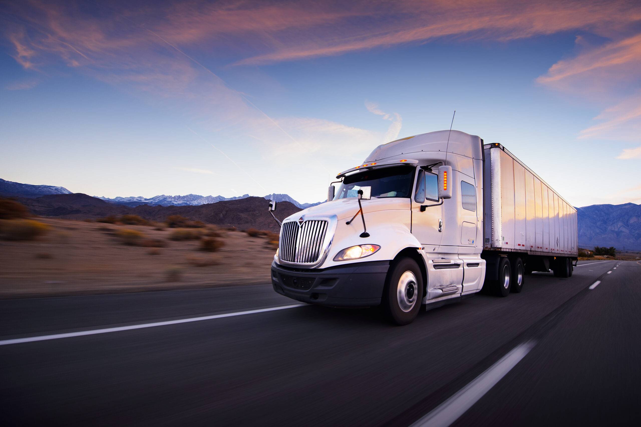 Truck And Highway At Sunset Transportation Background